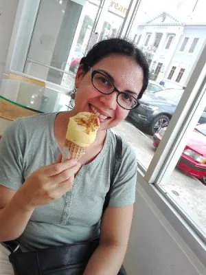 Author Delise Torres eating ice cream